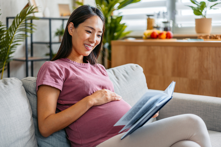 Pregnant Woman Reading A Book