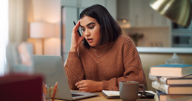 Stressed out Woman Working on Laptop