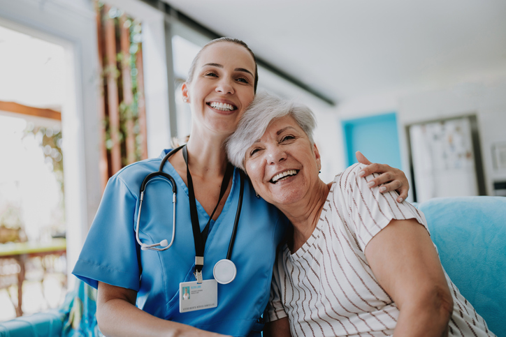 Smiling Woman with Nurse 