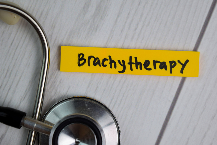 A slip of paper reading "Brachytherapy" sits next to a stethoscope 