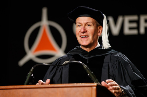 Riverside Healthcare President and CEO Phillip Kambic speaks during the Governors State University 2025 commencement ceremony
