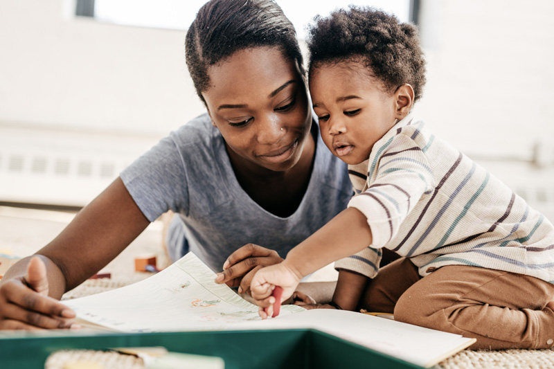 Mom reading for toddler