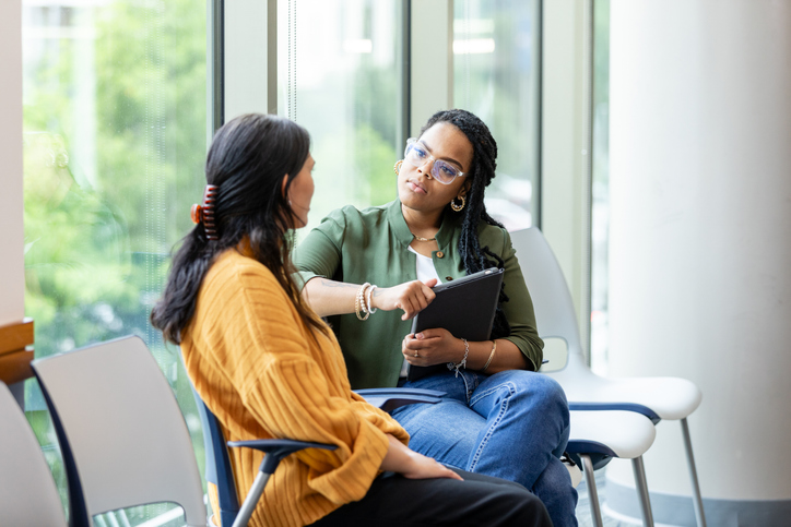 Female counselor listening to her patient