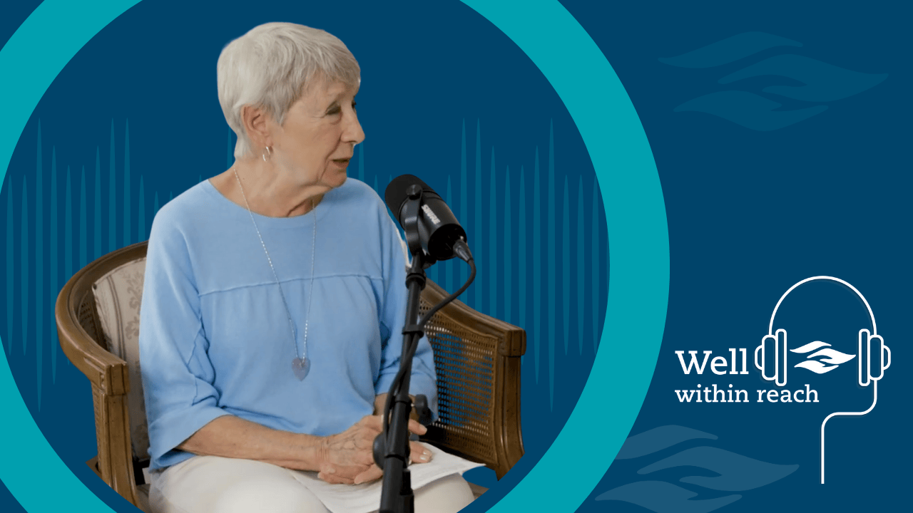 Lynn Ahlden smiling and speaking on Riverside’s Well Within Reach podcast set, sharing her story about heart attack care at Riverside Healthcare in Kankakee