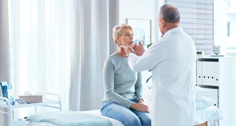Woman Being Examined by Doctor