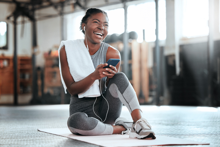 Woman smiling at the gym