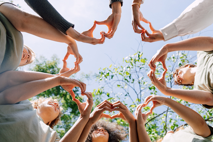 Group Making Hearts with their Hands