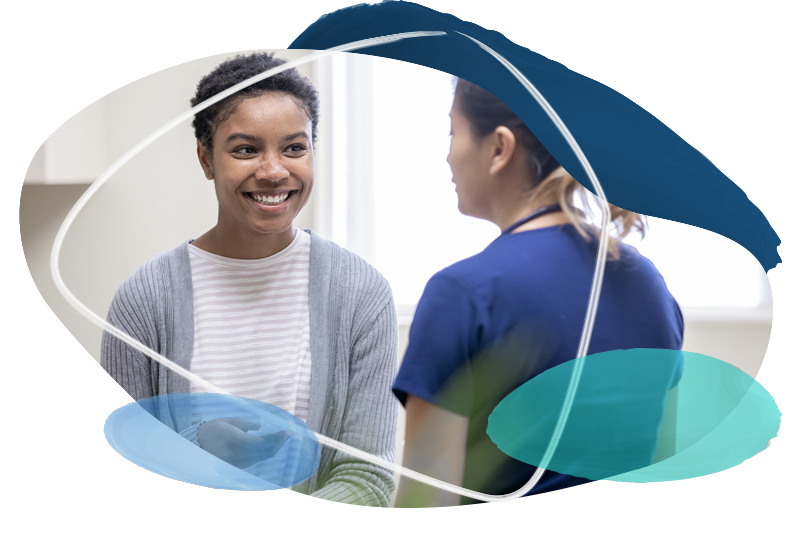 Nurse explaining good news to female patient