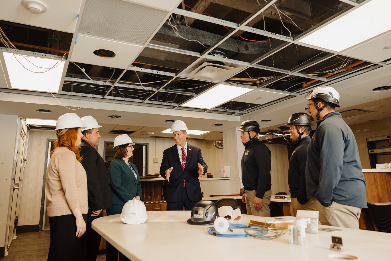 Riverside Healthcare President and CEO Phil Kambic talks with senior leadership and Michuda Construction about the second floor project expanding Riverside Medical Center's behavioral health unit