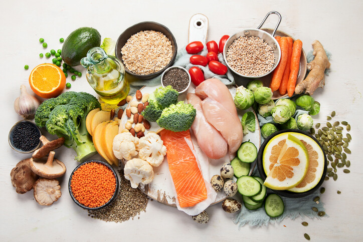 Nutritious foods like chicken, fish, fruits, grains, and vegetables