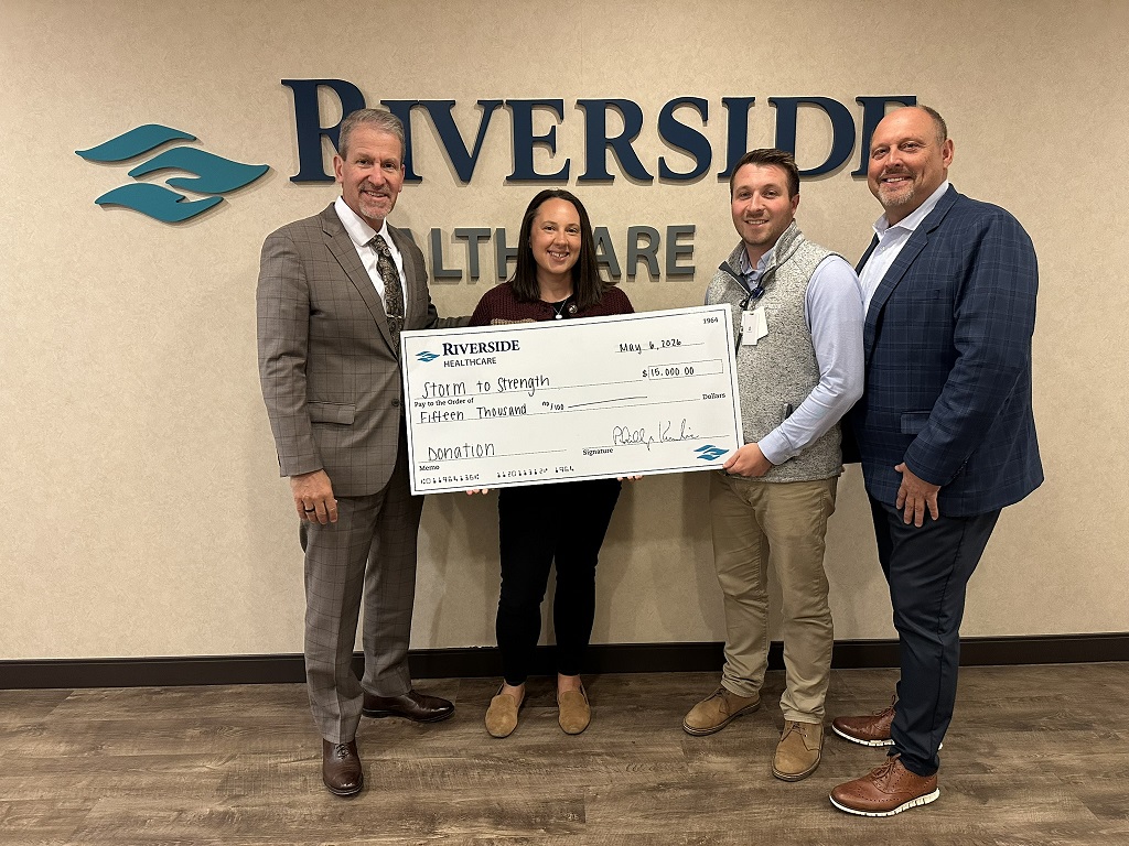 Present for the presentation are Kambic, Storm to Strength board member Meghan Elliott, Riverside ER Manager and Storm to Strength board member Drew Ogrentz and Storm to Strength board member Steve Harrison.