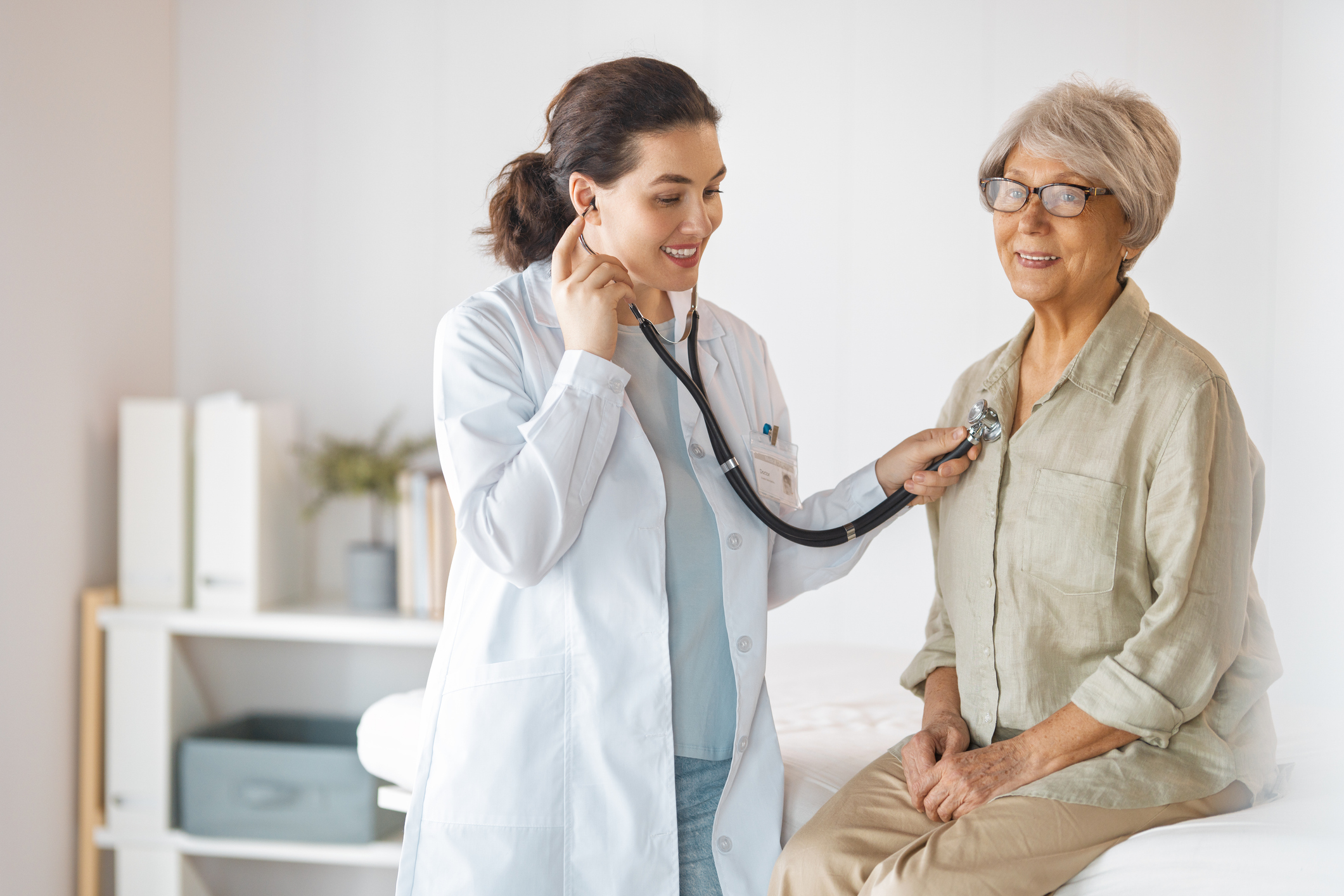 Mature woman with a female medical professional in a doctor's office