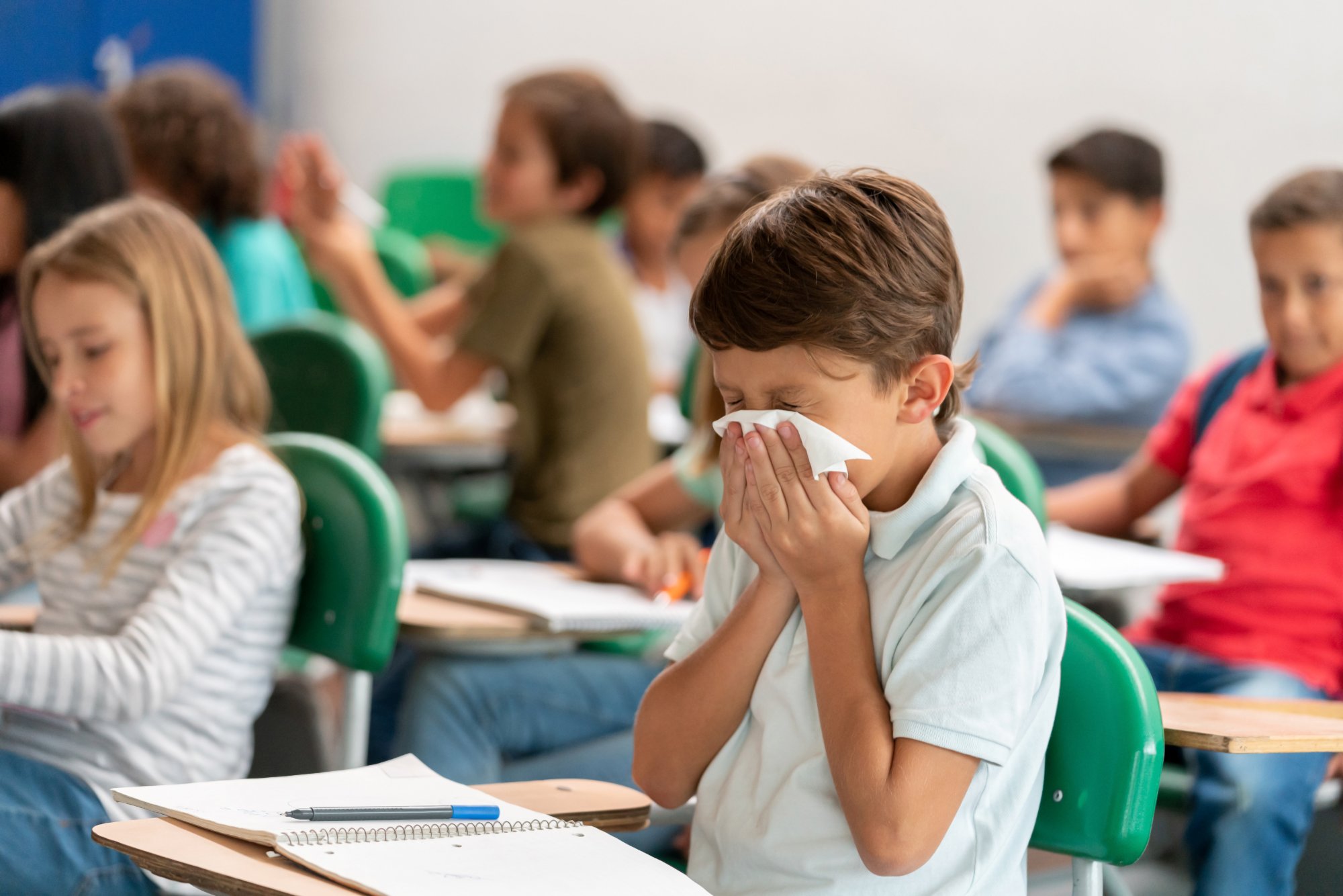 Kid sneezes in school