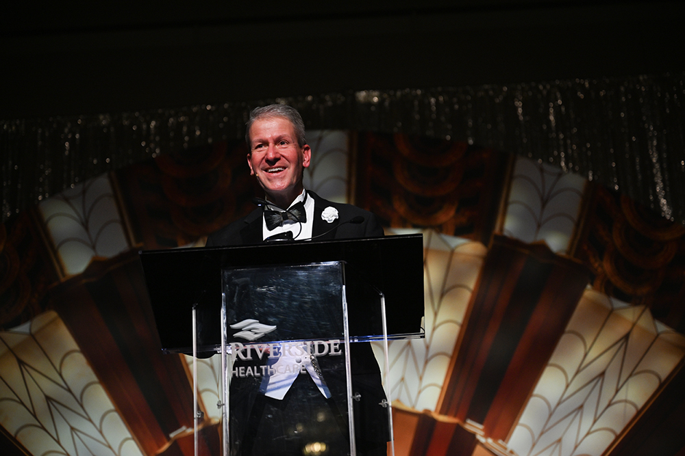 Heart Ball 2026 event photo — emcee at podium
