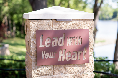 a sign found on the campus of Riverside Healthcare the read's "Lead With Your Heart"